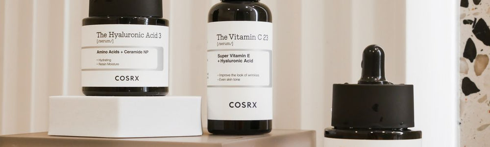 Editorial skincare image for a guide to tranexamic acid and dark spots.
