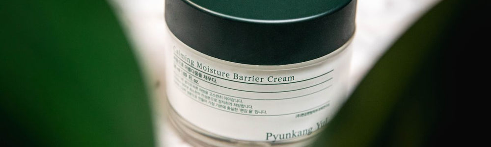 Skincare products arranged for a guide to choosing vegan Korean skincare.
