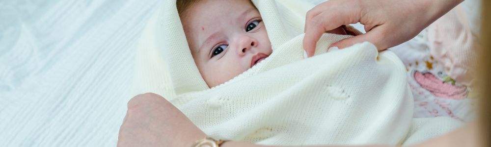Newborn eczema skin-care guide for parents focused on gentle moisturizing and pediatric guidance.