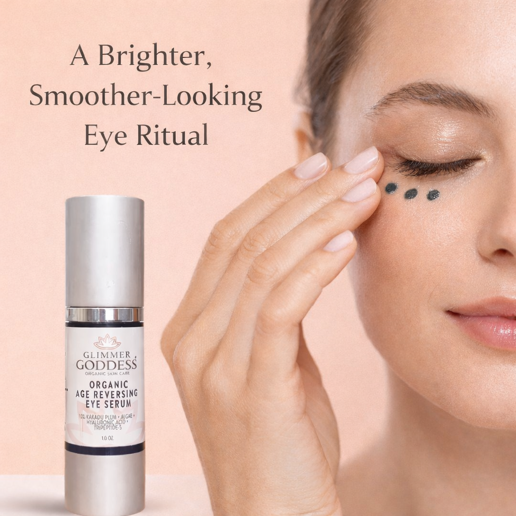Glimmer Goddess Organic Age Reversing Eye Serum for eyes with a sleek dropper bottle and skincare applicator in a natural setting