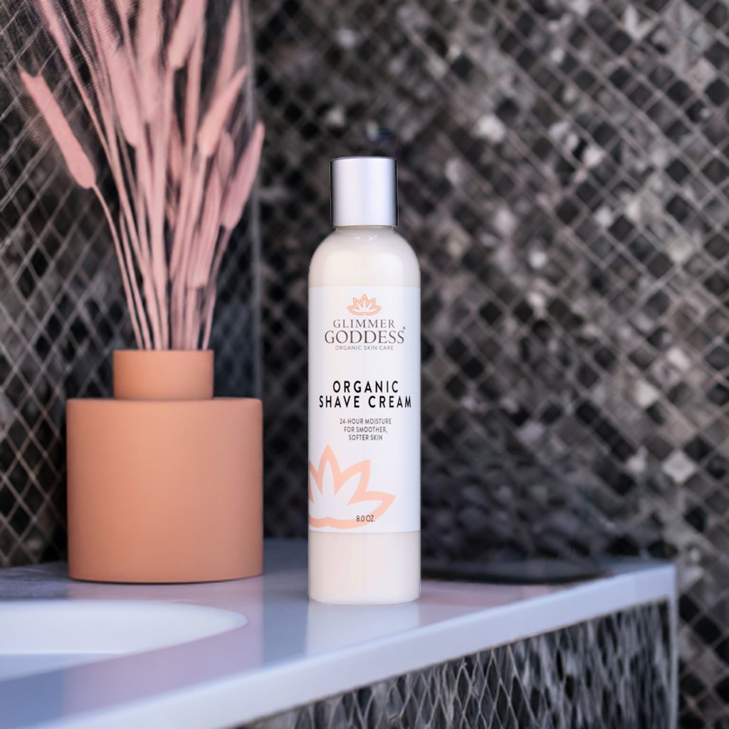 Organic Shave Cream bottle from Glimmer Goddess® on sink counter