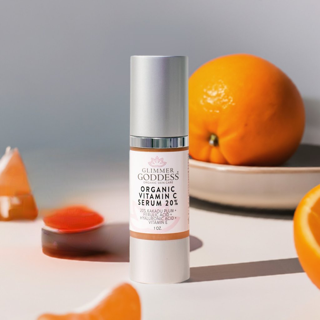 Organic Vitamin C Serum 20% Firm & Glow from Glimmer Goddess bottle by oranges