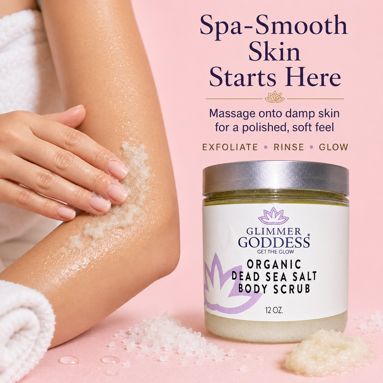 Glimmer Goddess Organic Dead Sea Salt Body Scrub jar beside a spa-style product-in-use scene showing scrub being massaged onto damp skin.