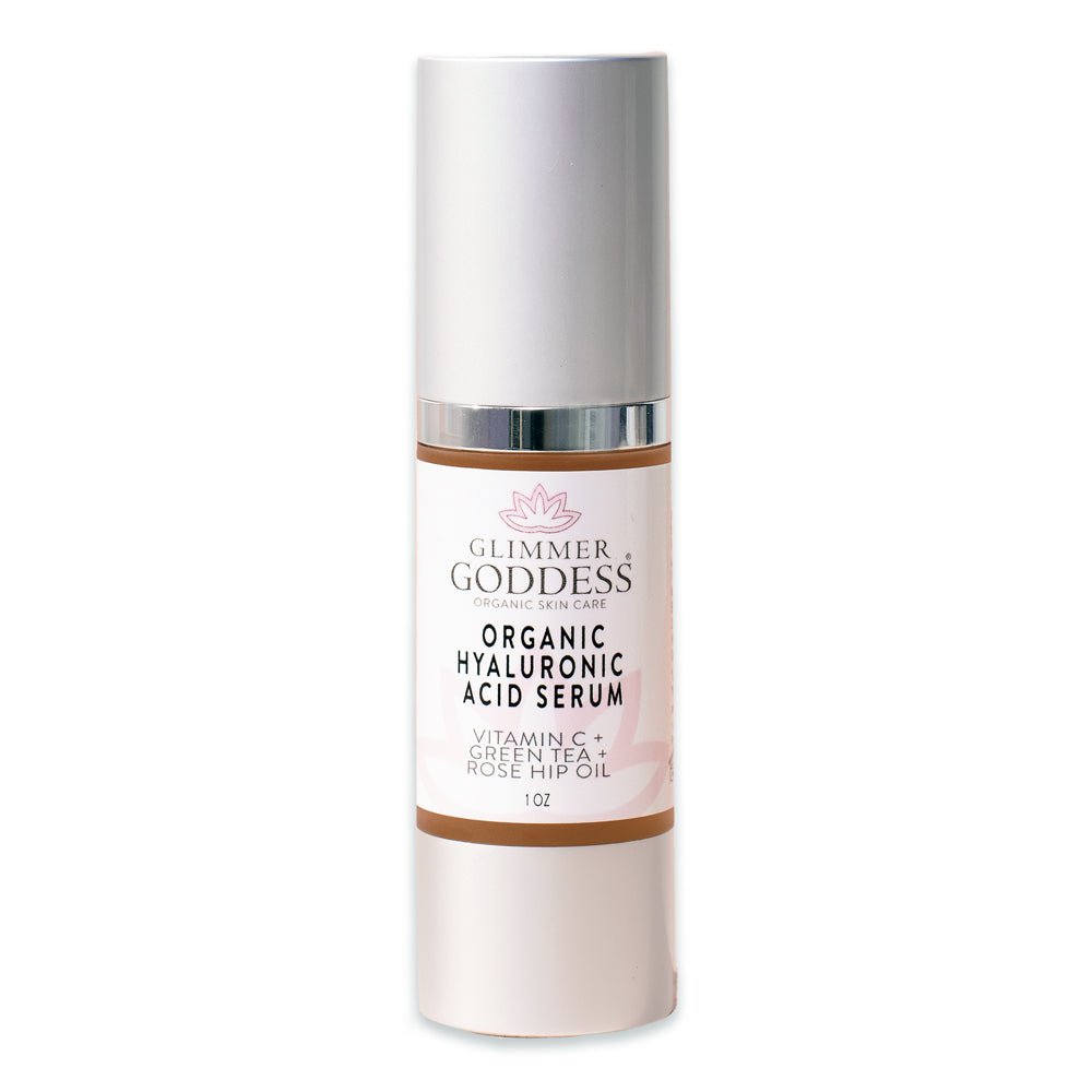 Glimmer Goddess Organic Skin Care hyaluronic acid serum in a dropper bottle, promoting skin hydration and plumping.