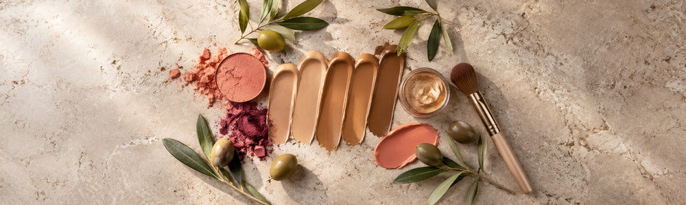Olive undertone makeup palette with complexion, blush, and gold tones