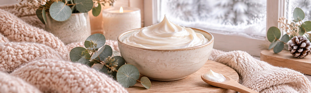 Rich moisturizer texture in a warm winter skincare setting