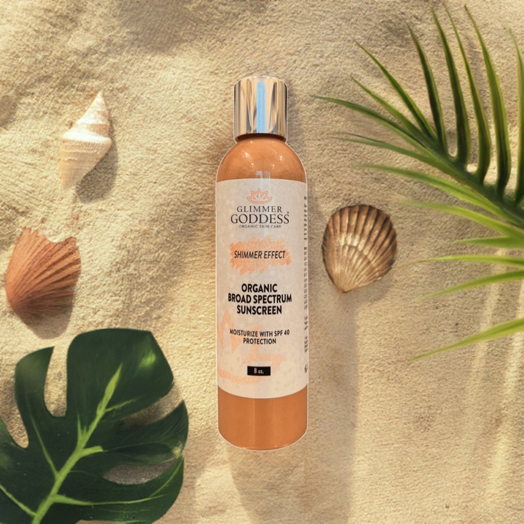 Organic Shimmer Suntan Lotion from Glimmer Goddess® in the sand