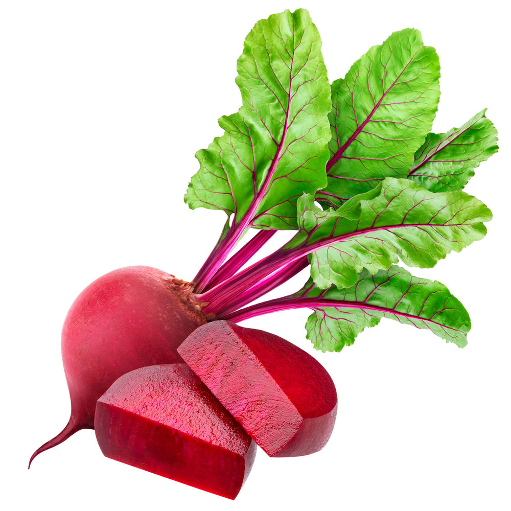 Fresh whole beetroot with green leaves and sliced beet on white background