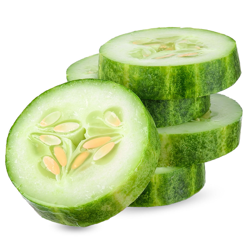 Fresh cucumber slices showing seeds and green skin, ideal for natural skin care ingredients