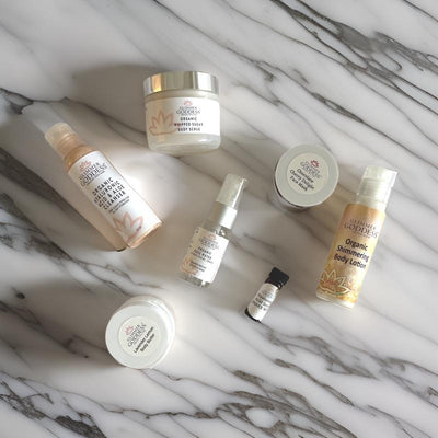 Organic Anti-Aging Deluxe Sample Kit by Glimmer Goddess® Organic Skin Care, featuring sample skincare products in a gift set.