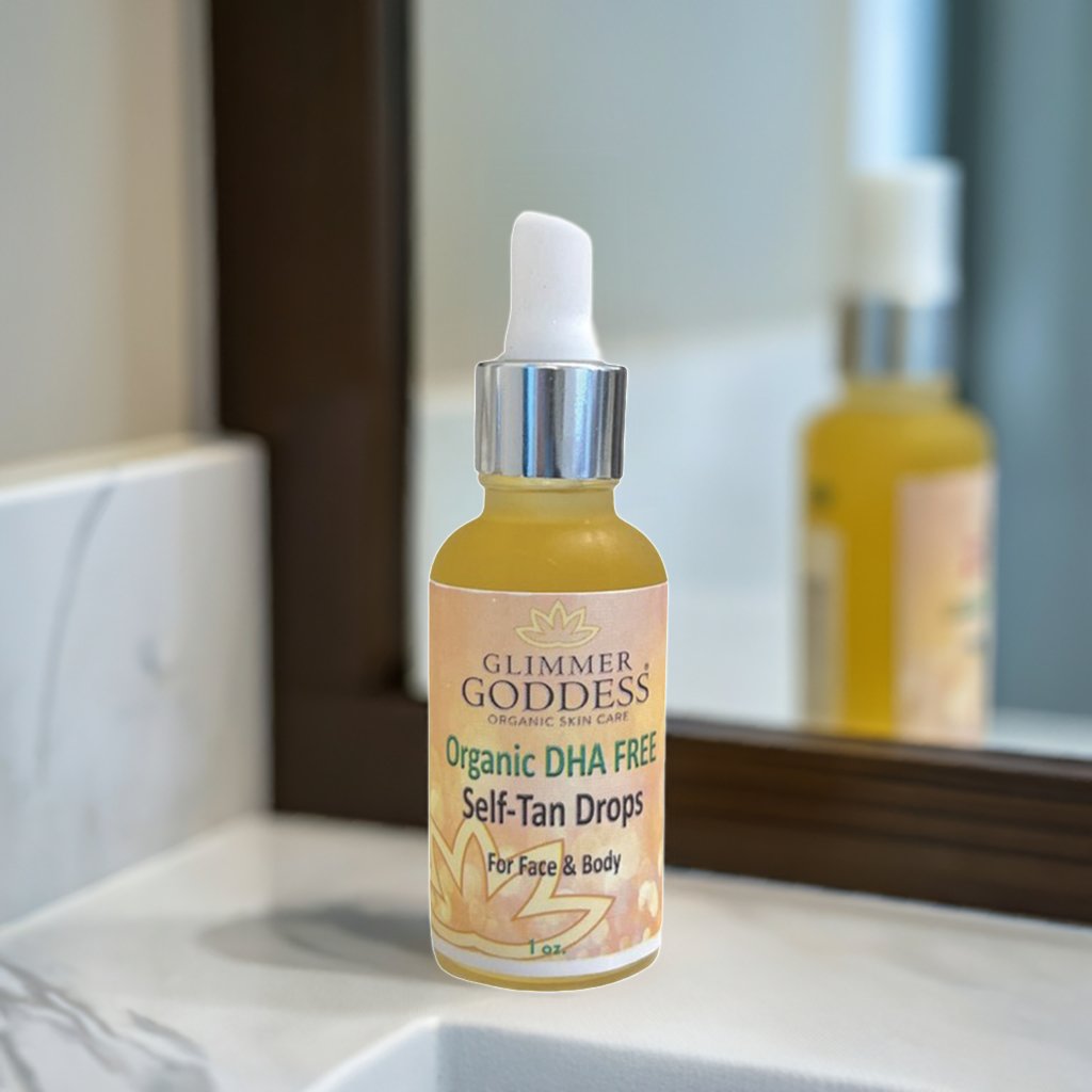 Organic DHA FREE Tanning Drops for Face & Body from Glimmer Goddess® on bathroom counter