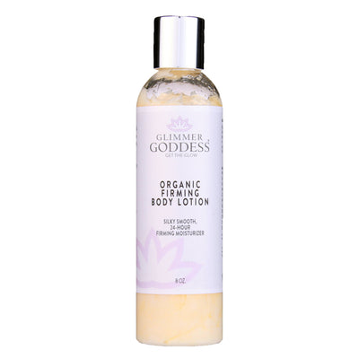 Organic firming body lotion by Glimmer Goddess, showing a sleek tube of skin tightening lotion with natural ingredients.