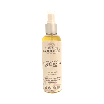 Organic luxury firming body oil by Glimmer Goddess® with evening primrose and rosehip oil for hydrating and anti-aging skin.