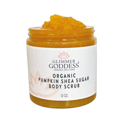 Organic pumpkin shea sugar body scrub in clear jar with orange scrub visible, 12 oz